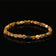 files/FrontviewofPicassoJasperandHematiteZenbraceletformen4x2mmbeadsonblackbackground.webp